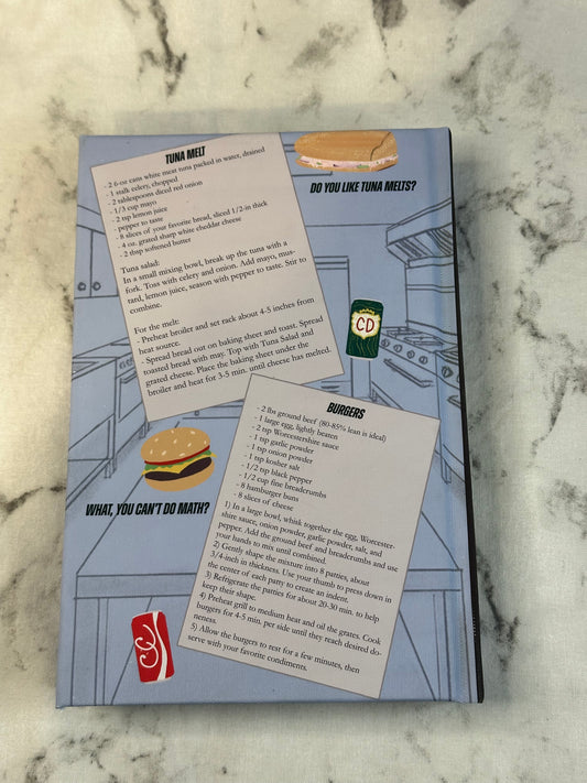 Book with recipes on a marble surface