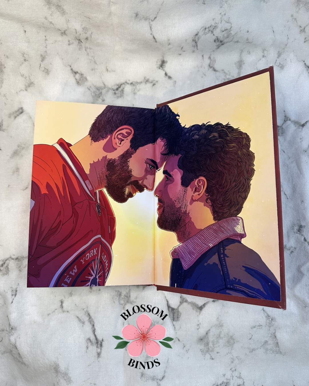 Paper illustration of two men on a marble surface, featuring the brand 'Blossom Binds'.