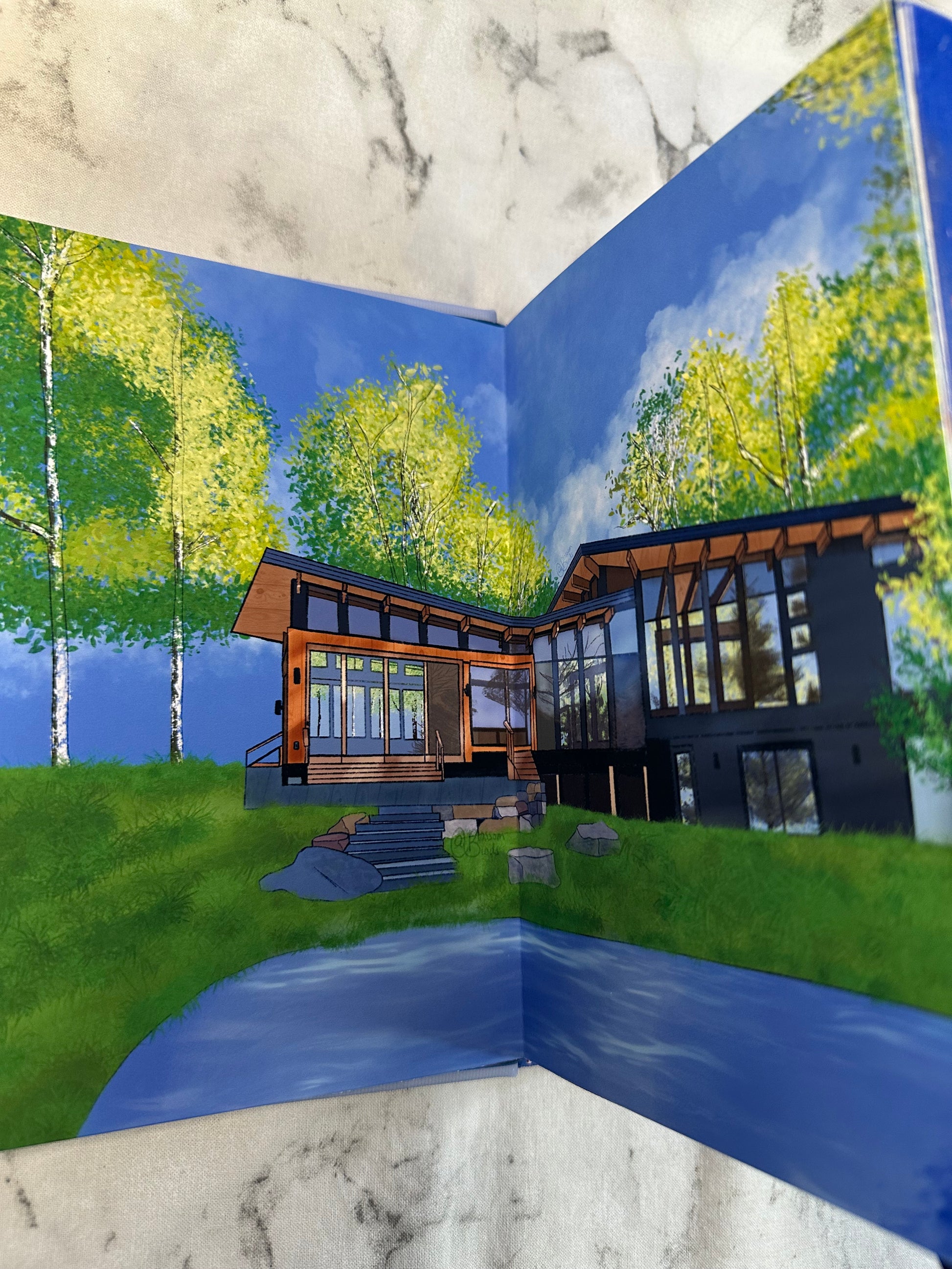 Drawing of 3D rendered house model with glass facade on a marble surface